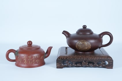 2 Chinese fine clay teapot. Largest H: 3.2" x W: 7."