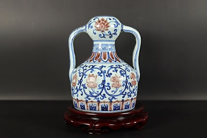Chinese fine red blue vase. H: 8" x W: 6.5."