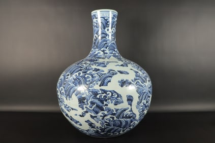 Chinese important fine blue and white dragon vase. H: 17" x W: 14.4."