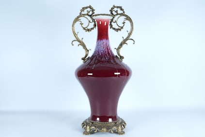 Chinese fine tall red vase, with bronze setting. H: 20.5" x W: 10."