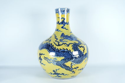 Chinese fine yellow dragon vase. H: 17" x W: 12."