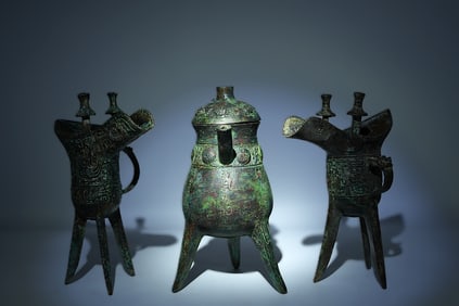 Lots Chinese bronze vessels. Largest H: 8.5" x W: 4."