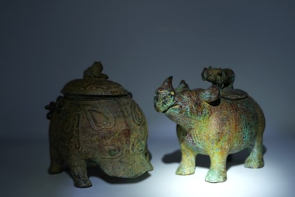 Lots Chinese bronze vessels. Largest H: 7.5" x W: 9."