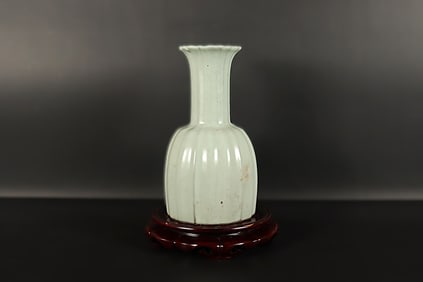 Chinese fine celadon vase. H: 9" x W: 4.5."