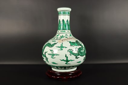 Chinese fine green dragon vase. H: 12" x W: 8."