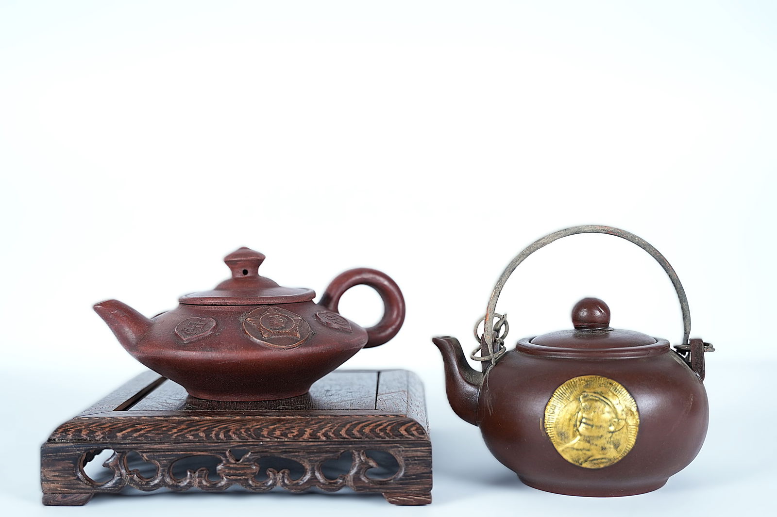 Lots Chinese clay teapots. Largest H: 3" x W: 6.5." (1 of 7)