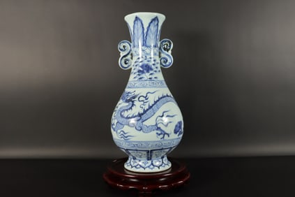 Chinese fine blue and white dragon vase. H: 12" x W: 6."