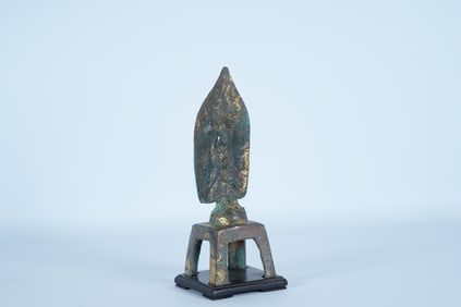 Chinese fine bronze buddha, from an estate. Comes with wooden stand. H: 7" x W: 2."