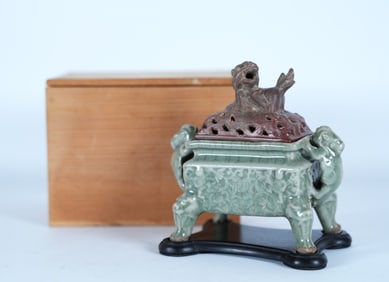 Chinese fine celadon censer. Comes with wooden box. H: 5.2" x W: 4.8."
