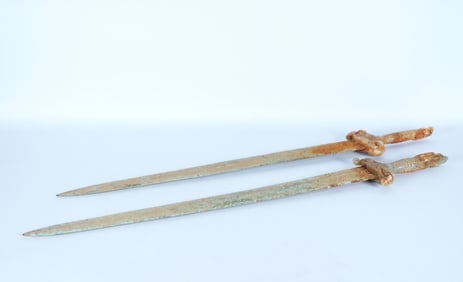 2 Chinese fine long sword. Longest L: 24.5" x W: 3.5."