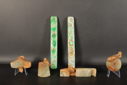 Lots Chinese fine carvings. Largest H: 2.5" x W: 7.5."