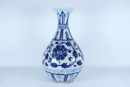 Chinese large blue and white vase, condition selling it as is. H: 17.1" x W: 10.5."