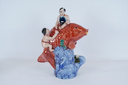 Chinese fine children vase. H: 13" x W: 9."