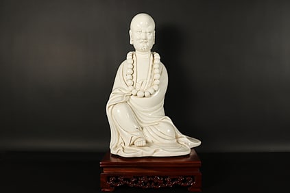 Chinese fine porcelain statue. H: 13" x W: 9."
