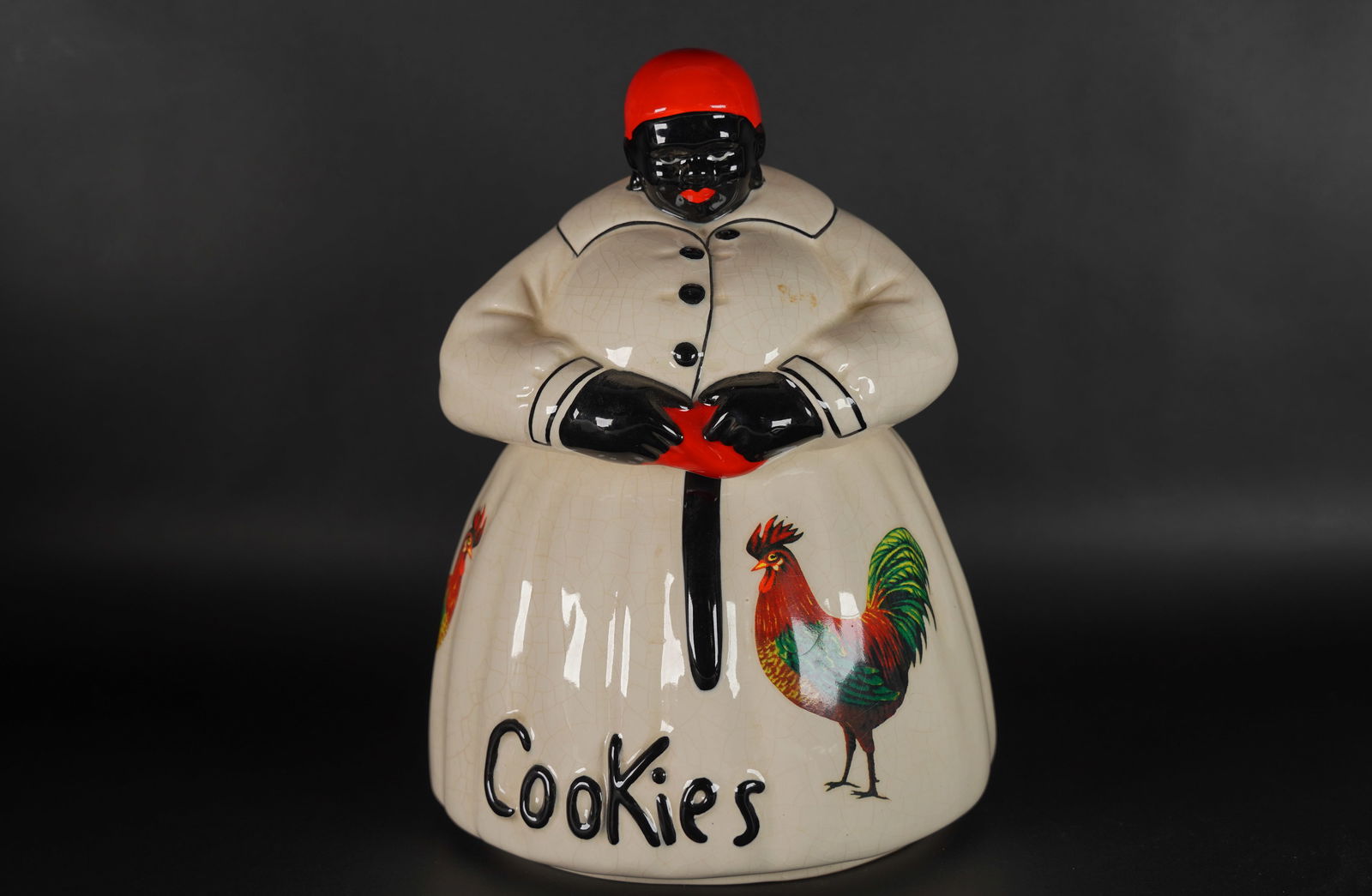 A vintage McCoy cookie jar: A vintage McCoy fine cookie jar. H: 11" x W: 8."