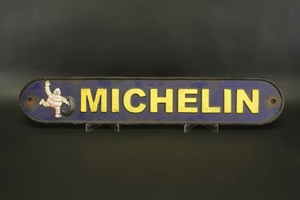 A Michelin cast iron sign