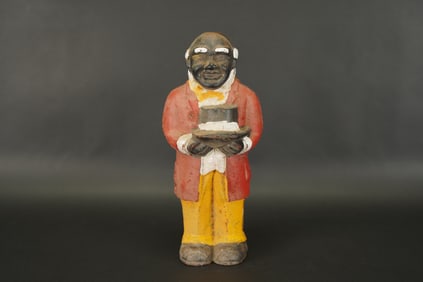 A Black Americana cast iron bank