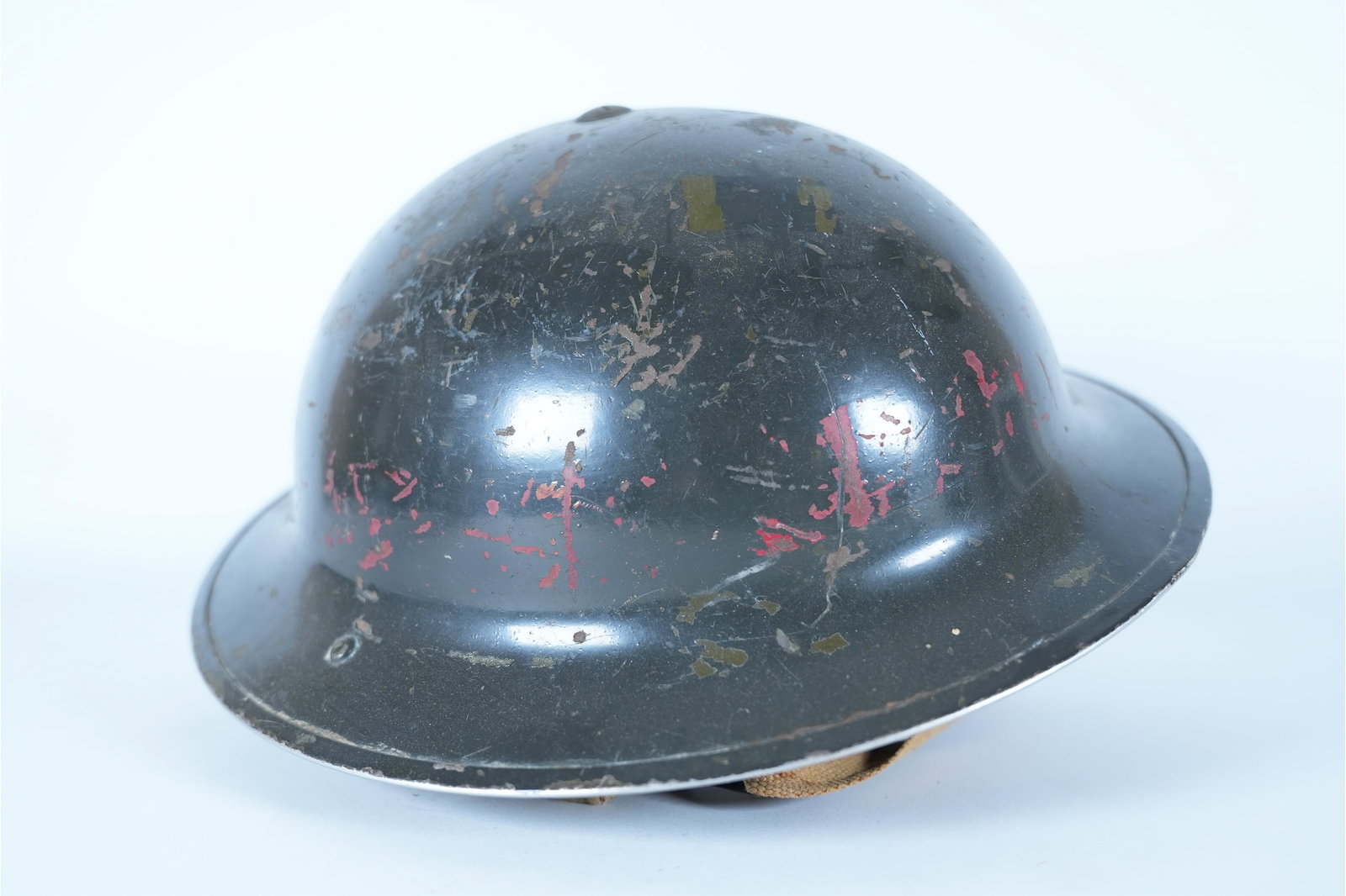 A vintage fine military helmet: A vintage fine military helmet, possibly WWII.