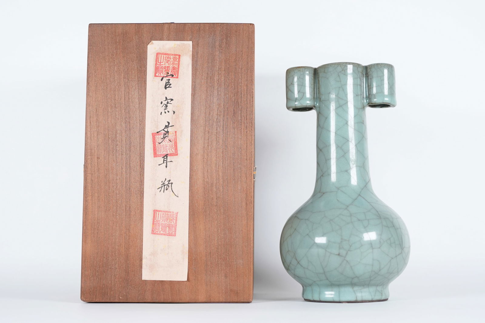 Chinese fine crackled vase: Chinese fine crackled vase, with wooden box. From a major estate. H: 9.5" x W: 5."