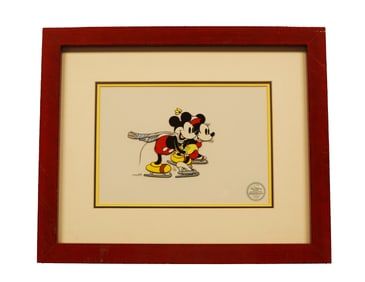 A framed Disney fine art