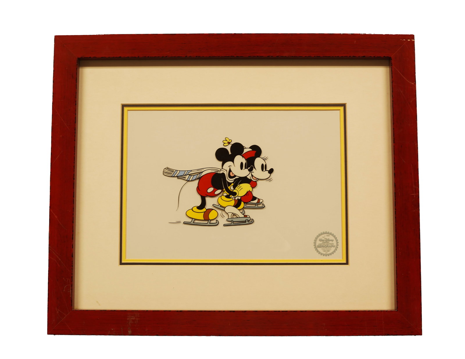 A framed Disney fine art: A framed Disney fine art. H: 18.5" x W: 22.5."