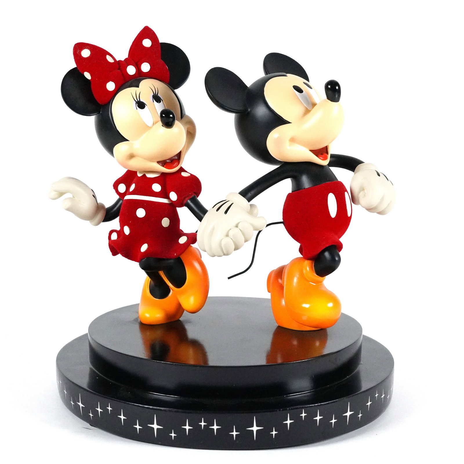 Mickey Minnie Disney scuplture: Mickey Minnie limited 2500 numbered rare sculpture. Comes with original box, and certificate. H: 9.5" x W: 8.7."