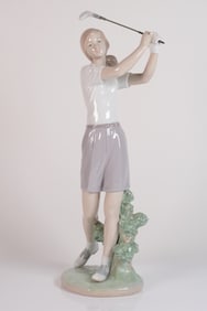 A Lladro golfer figurine