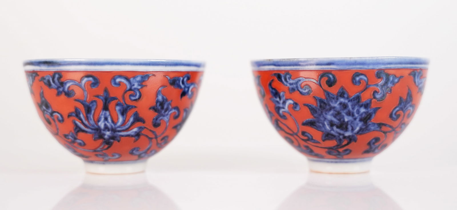 2 Chinese red cups: 2 Chinese fine red cups, largest H: 2" x W: 3."