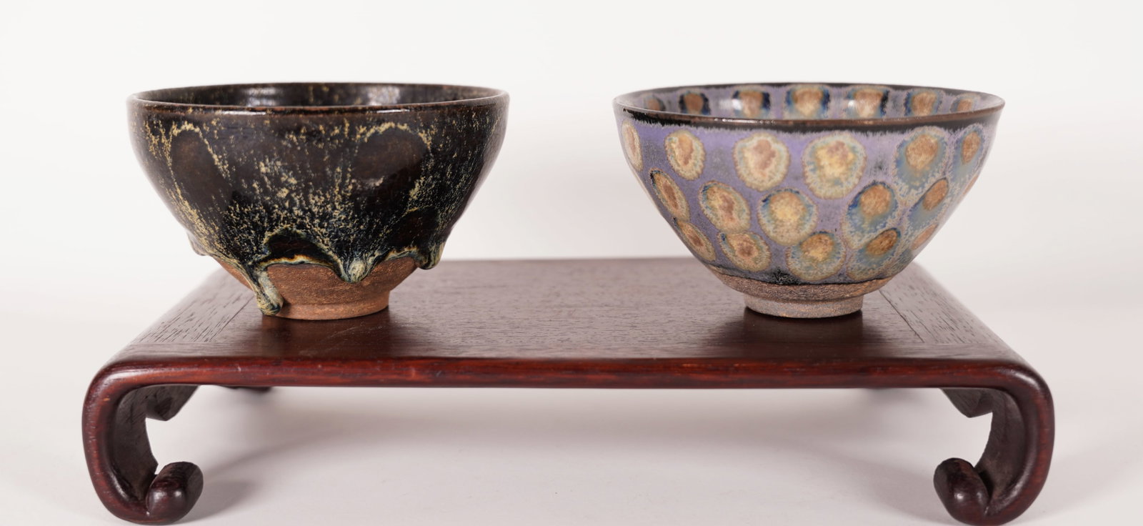 2 Chinese tea bowls: 2 Chinese fine tea bowls. Largest H: 3" x W: 5."