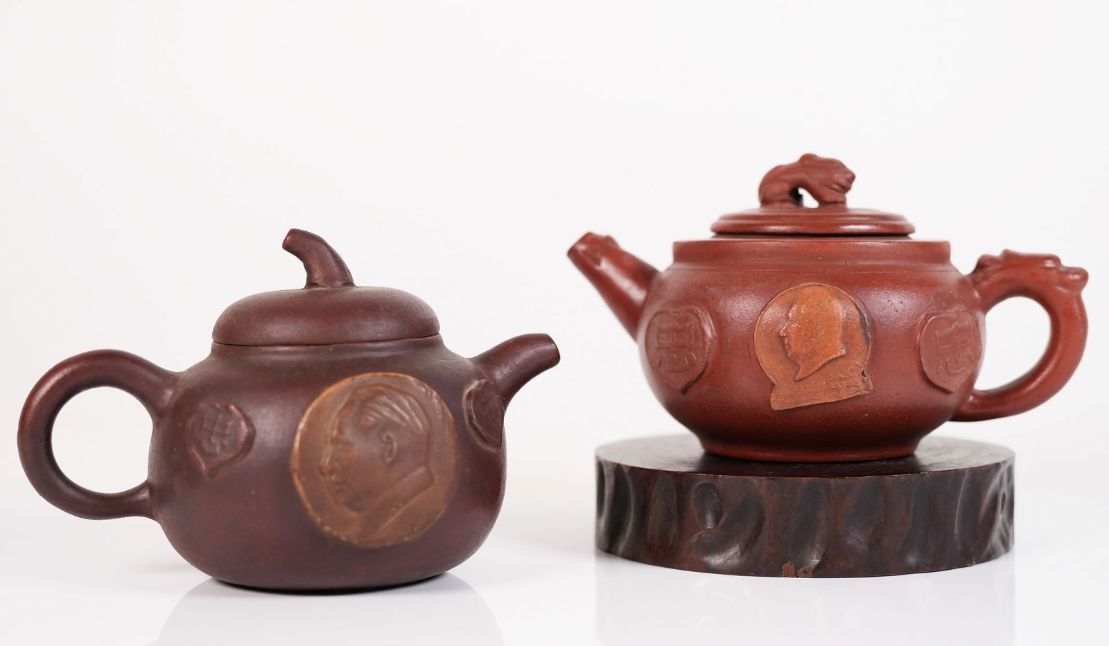 Lots Chinese clay teapots: Lots Chinese clay teapots. Largest H: 4" x W: 6.5."