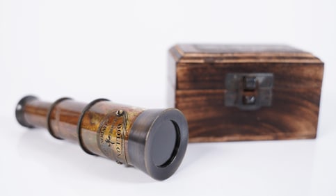 A vintage telescope in box