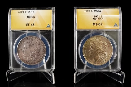 2 antique Morgan dollar graded