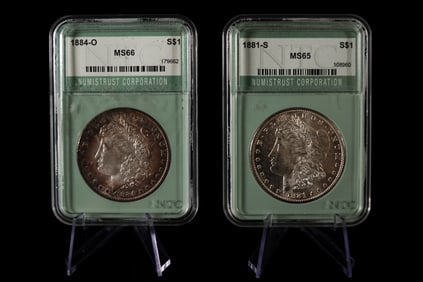 2 antique Morgan dollar graded