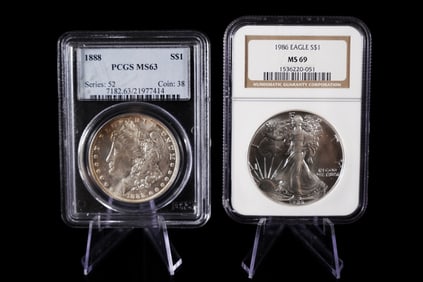 2 antique graded U.S. dollar