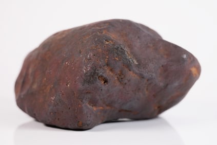 A heavy meteorite like boulder stone