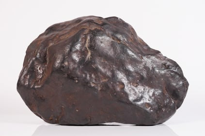 A heavy meteorite like boulder stone