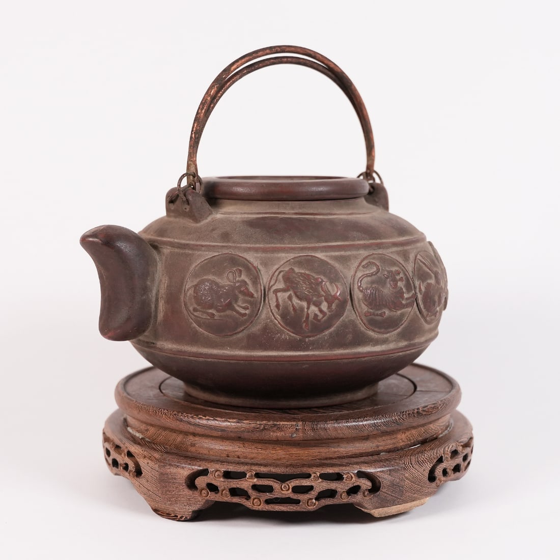 Chinese antique clay teapot: Chinese antique fine clay teapot. H: 6.5" x W: 10.2."