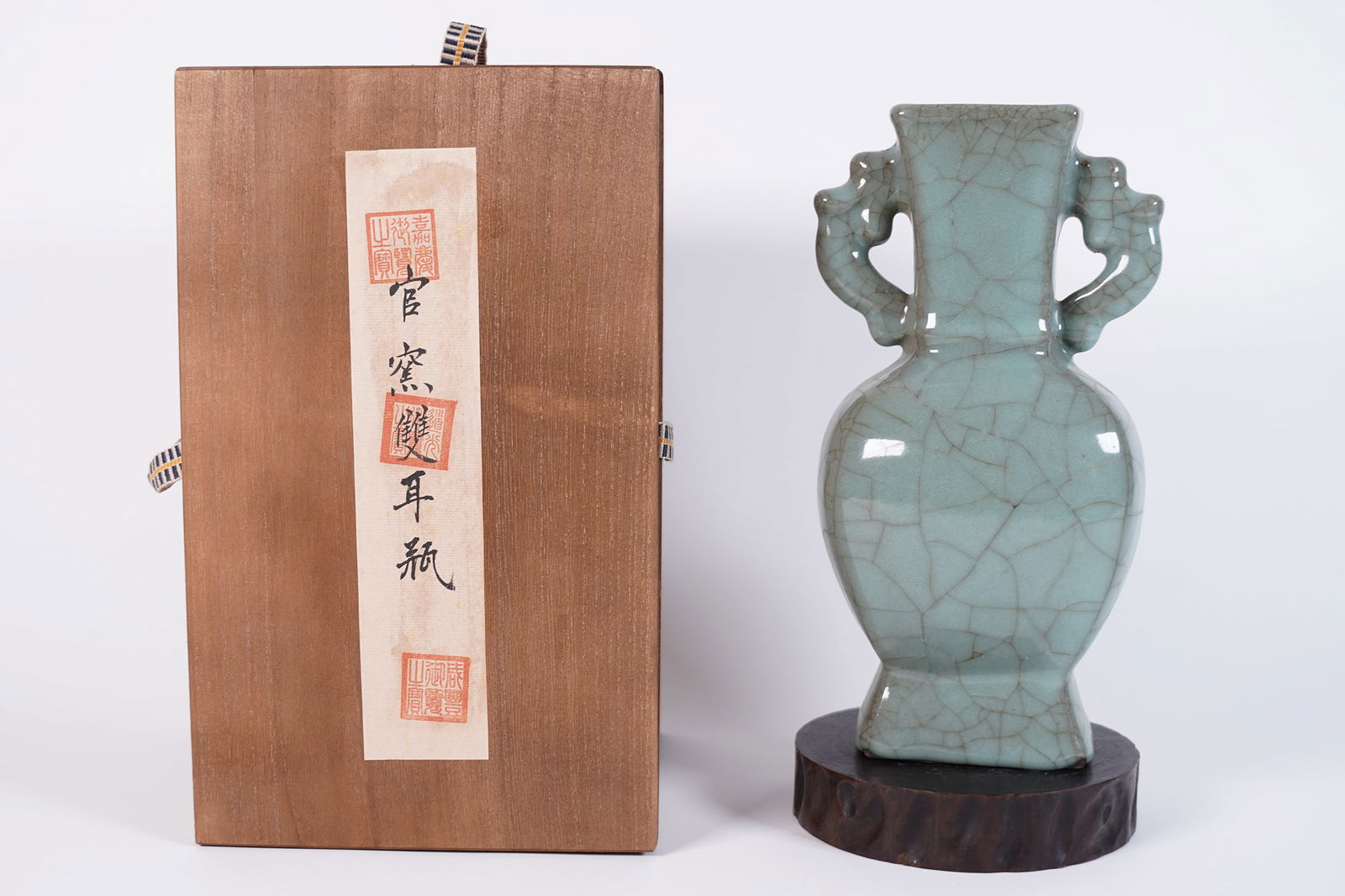 Chinese fine crackled vase in box: Chinese fine crackled vase in wooden box. H: 9.8" x W: 5.2."