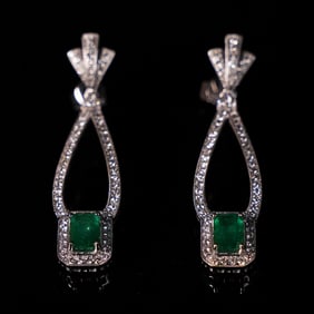 Set platinum natural emerald earrings
