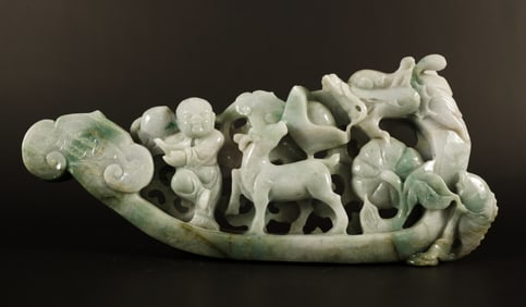 Chinese jadeite boy on boat
