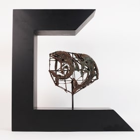 Southeast Asian sculpture on stand