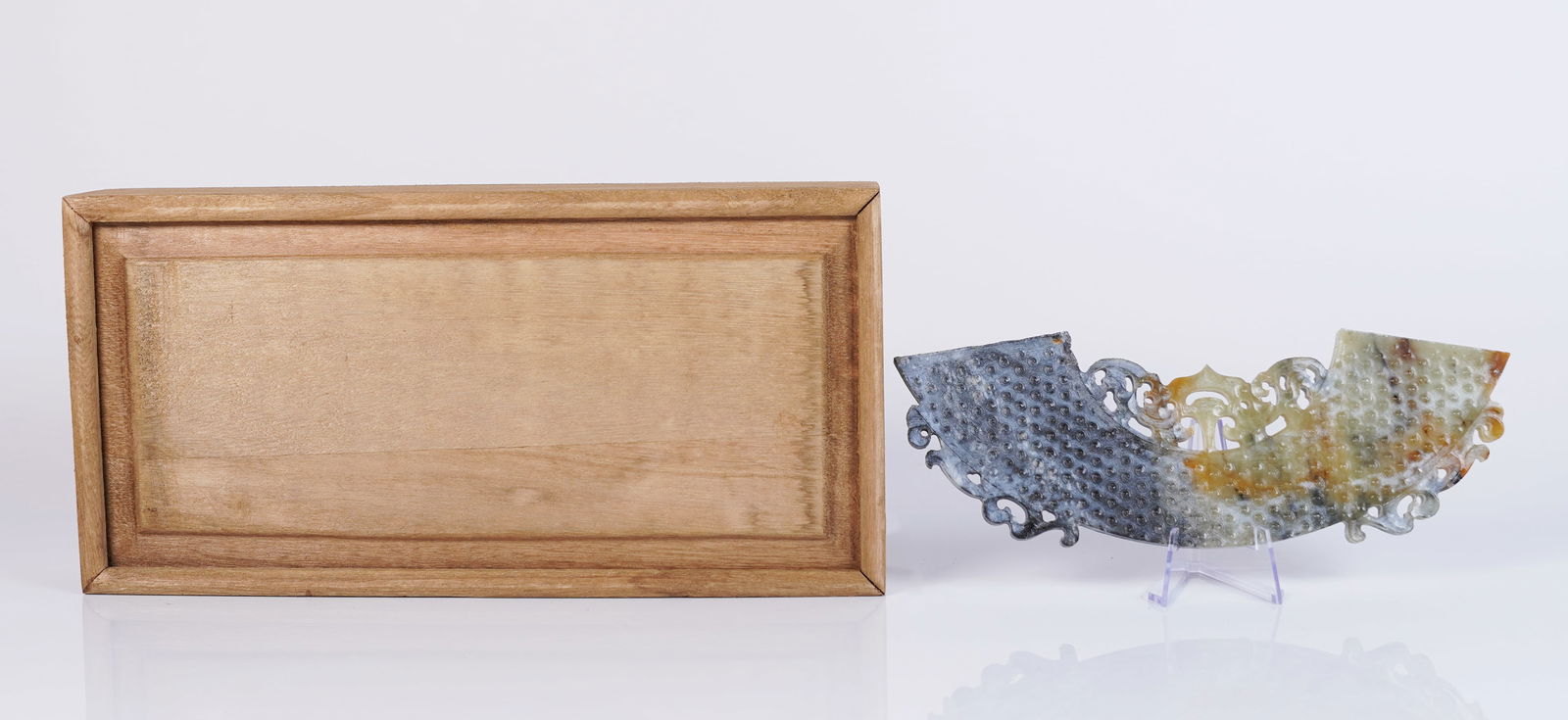 Chinese jade ornament in box: Chinese jade ornament in box. H: 7.75" x W: 2.51."