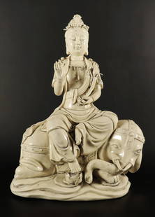 Chinese tall white statue: Chinese tall white statue. H: 15.5" x W: 11.5."