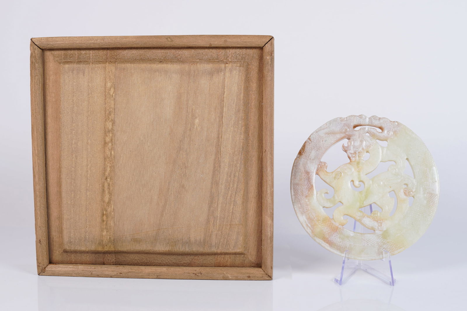 Chinese carved ornament in box: Chinese carved ornament in wooden box. H: 4.2" x W: 4.2."