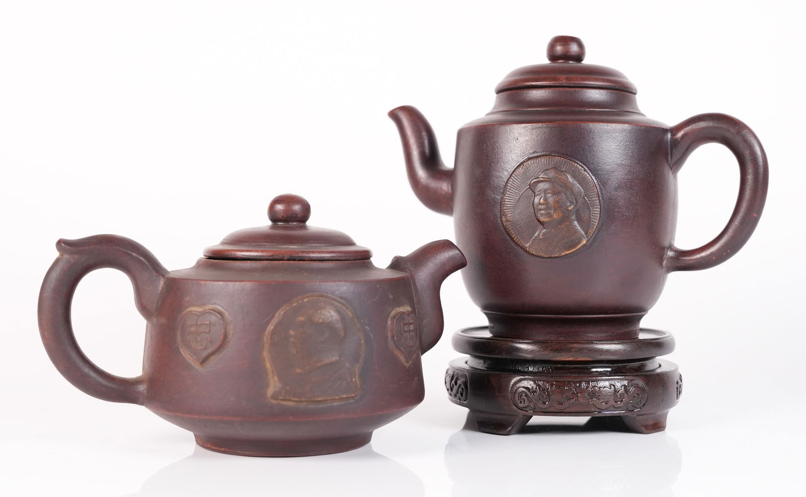 Lots Chinese clay teapots: Lots Chinese clay teapots. Largest H: 5.5" x W: 7."