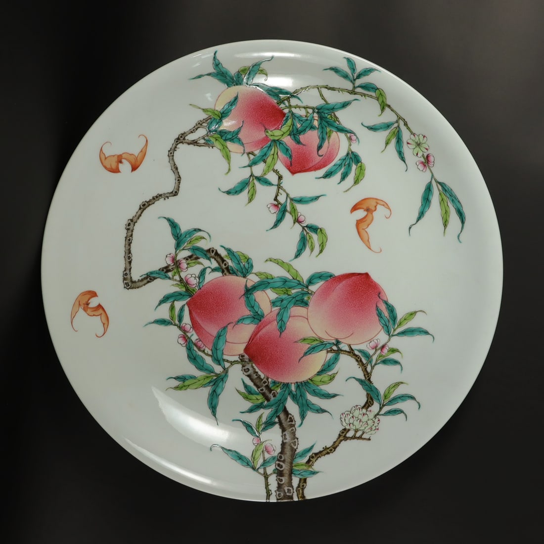 Chinese fine peach charger: Chinese fine peach charger. H: 3.12" x W: 16.62."
