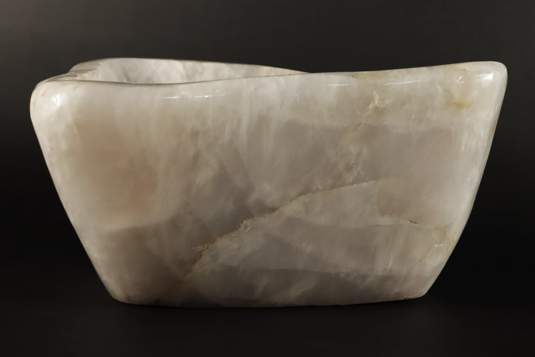 A stone carved ashtray: A stone carved ashtray. H: 6" x W: 12.5."