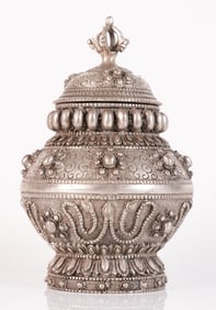 Tibetan carved lidded pot