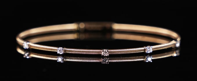 14 kt gold diamond bangle