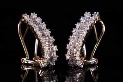 Pair 14kt y/g diamond earrings